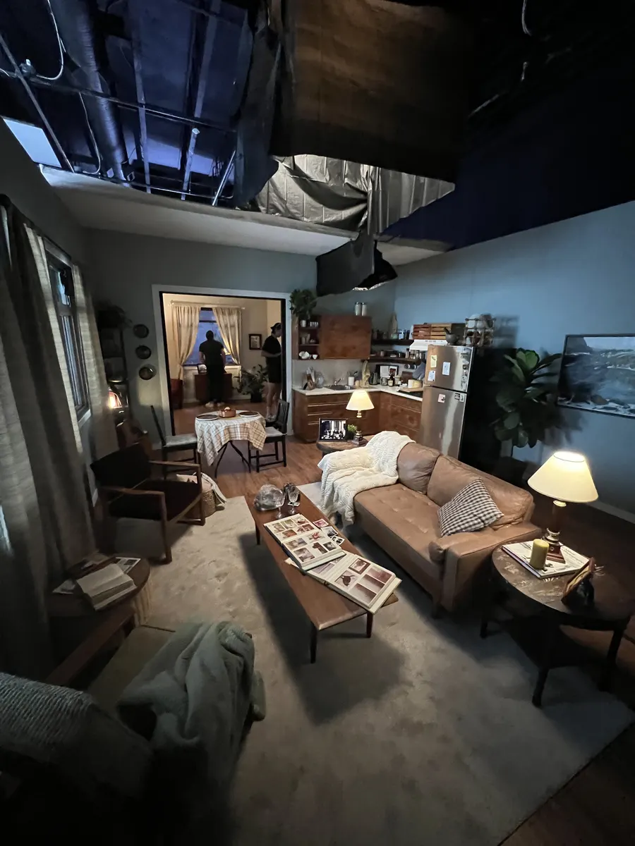 Wide behind-the-scenes view of the Blood Brothers apartment set